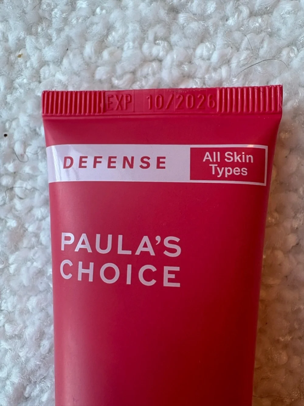 Paula's Choice Essential Glow Moisturizer Tube in Red and Clear
